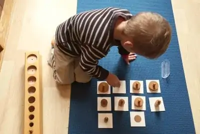 child playing on rug